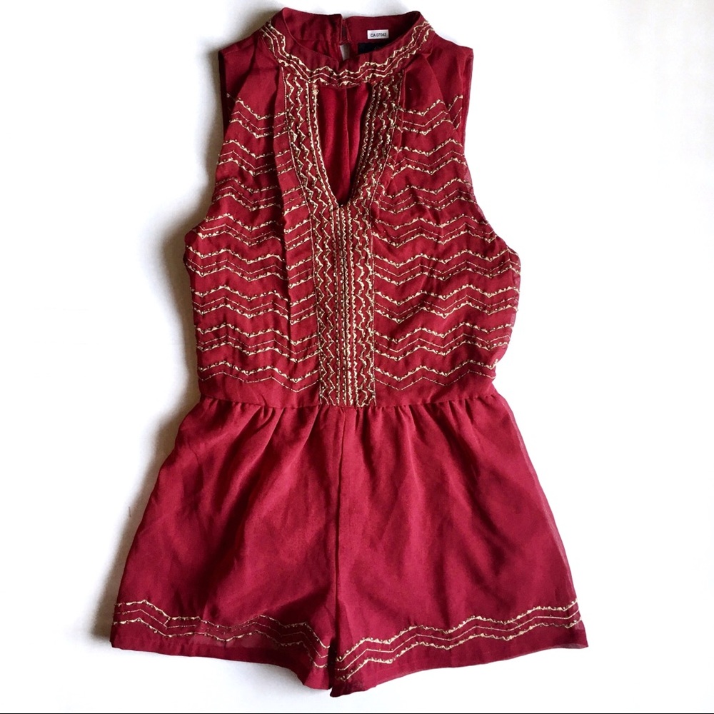 Angie dressy burgundy romper in size medium